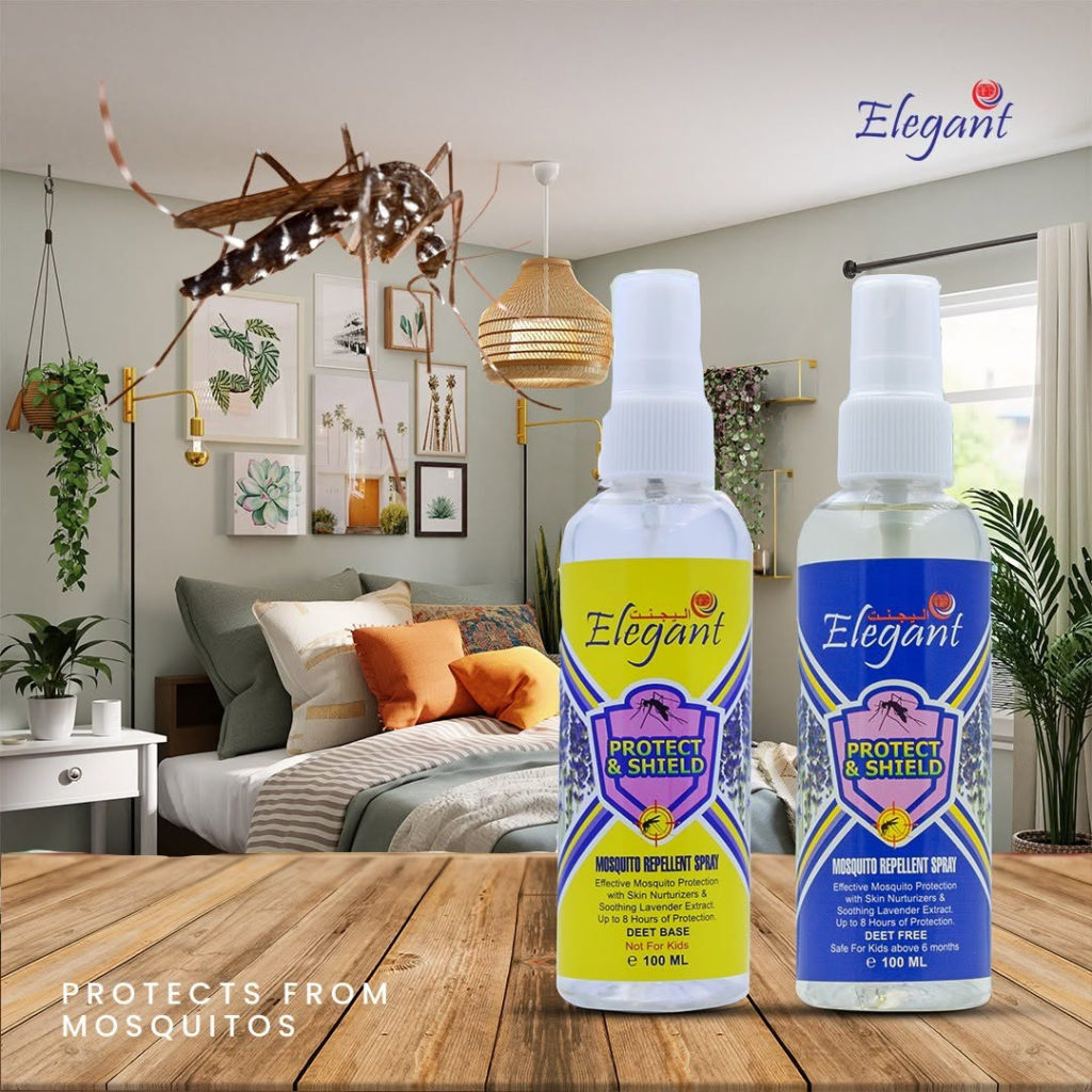 Elegant mosquito repellent spray bottles with protect and shield label placed on a table in a bedroom setting with mosquito illustration above